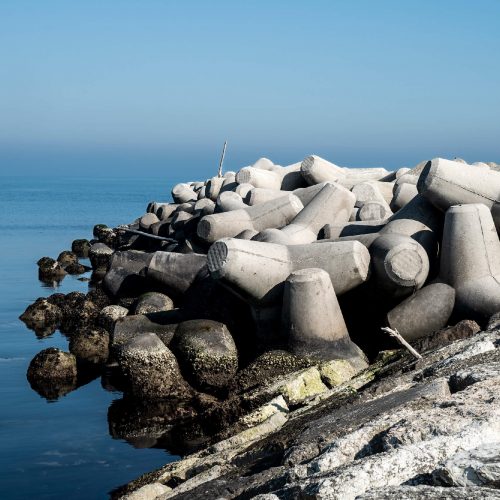 Breakwater barriers close to the pier